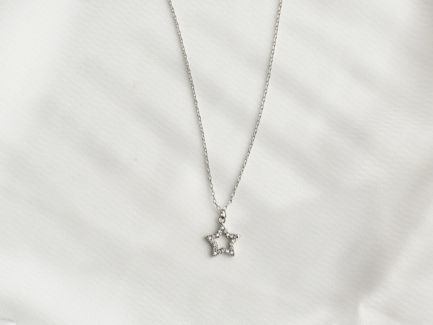 Silver Cut-Out Star Necklace