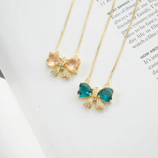 Studded Bow Pendant Necklace